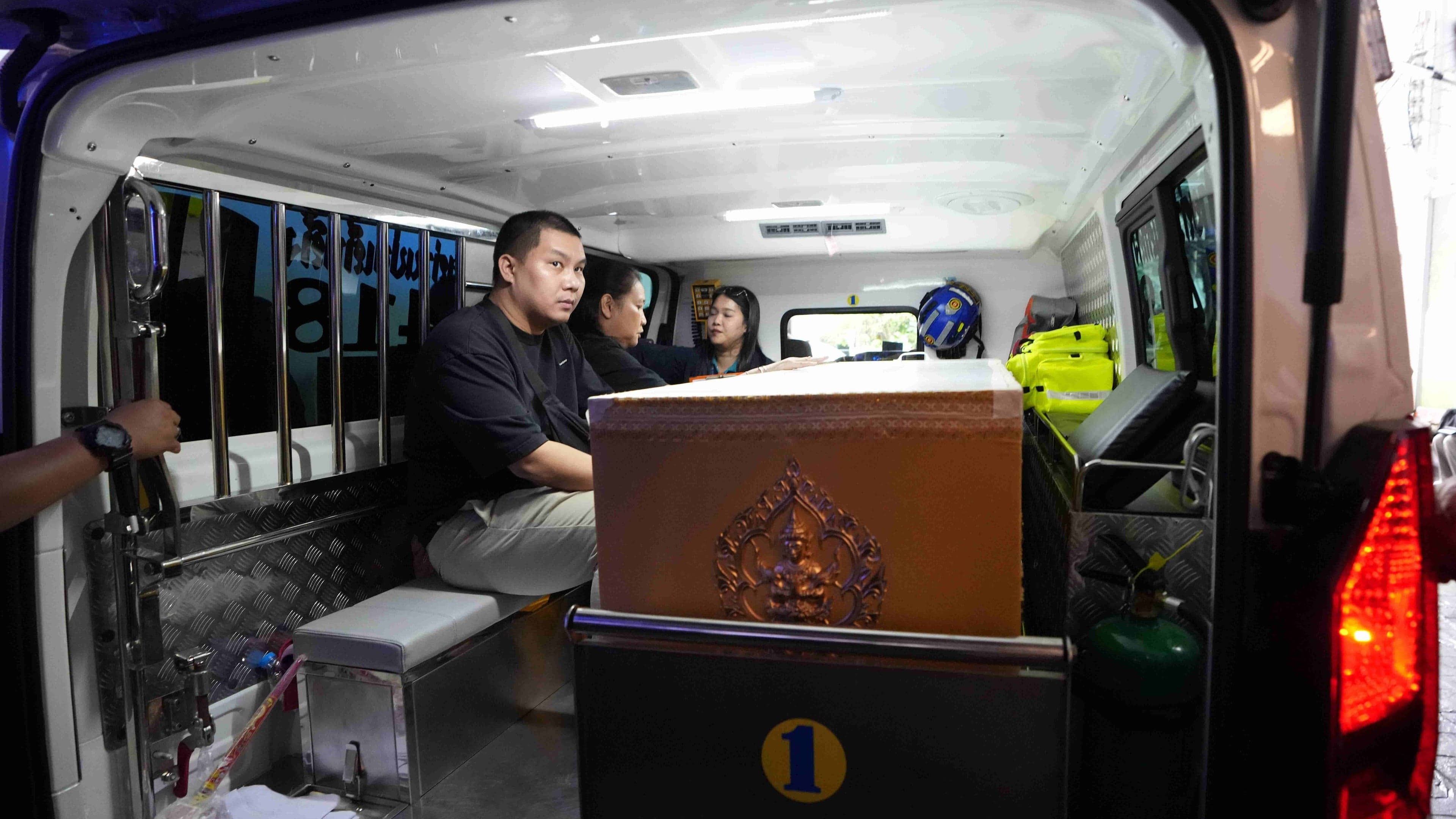 Families retrieve bodies after teenage gunman kills at least seven in Thailand