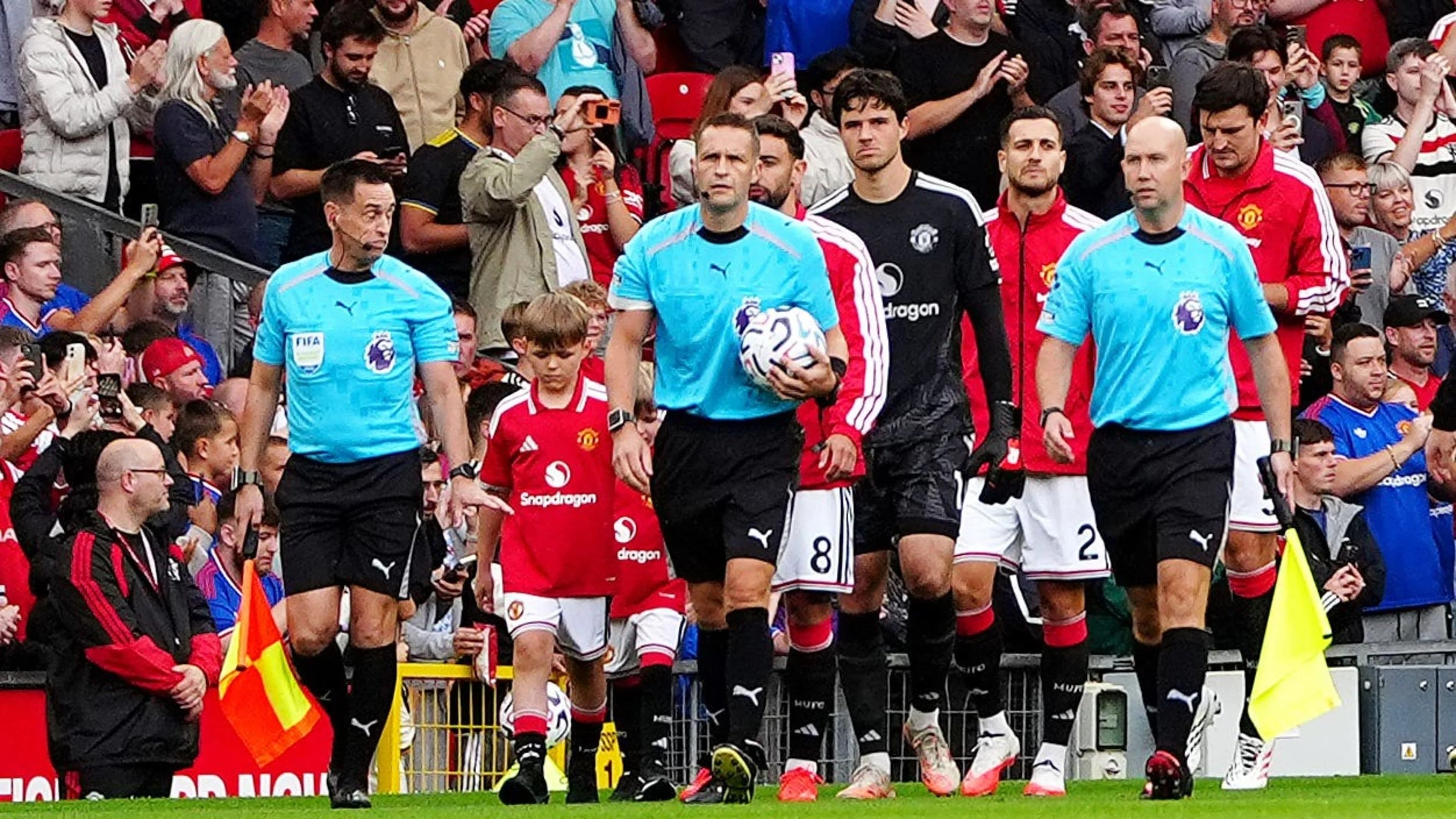 Sons of police officer killed in A66 crash lead out Man United at Old Trafford