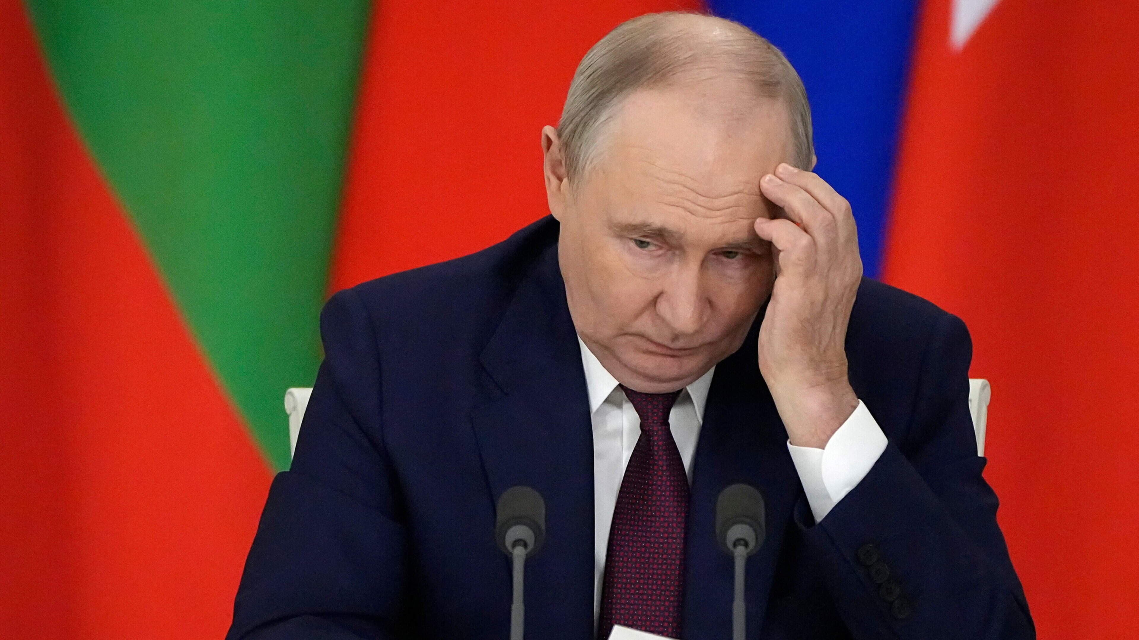 Russians withdraw billions from banks amid fears Vladimir Putin could seize deposits