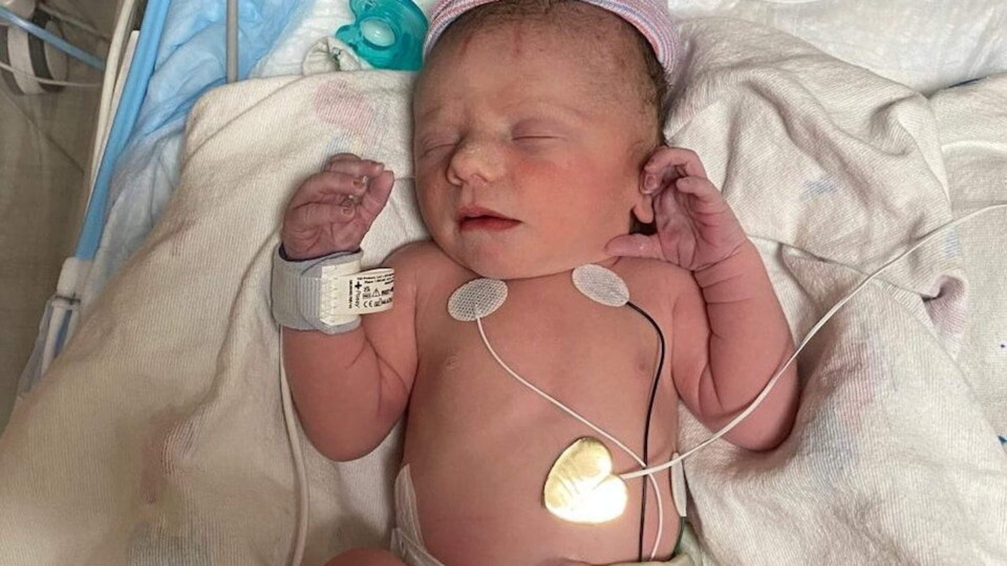 ‘He’s a little miracle,’ says mother after unborn baby has pioneering surgery inside womb