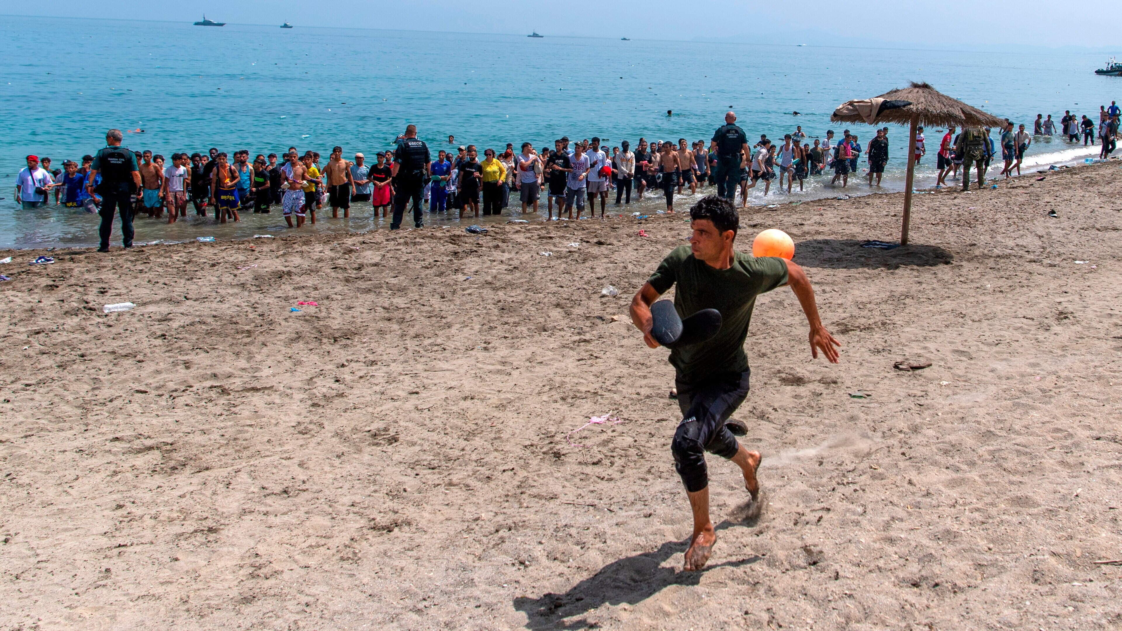 ‘Absolute chaos’ as migrant exodus from Morocco to Spanish territory sparks border crisis in Europe
