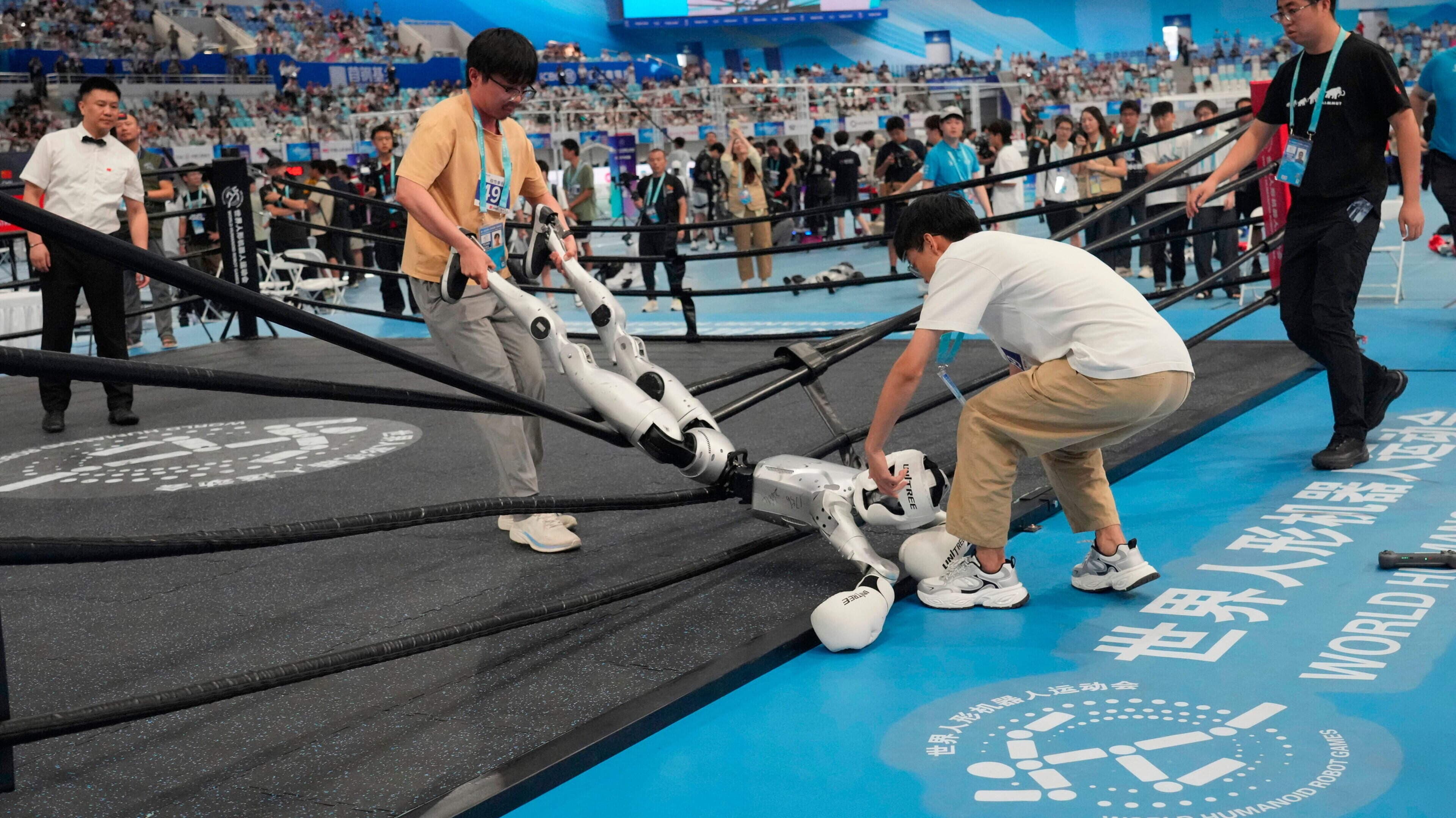 Robots can outrun Usain Bolt, but can they plug in a cable?