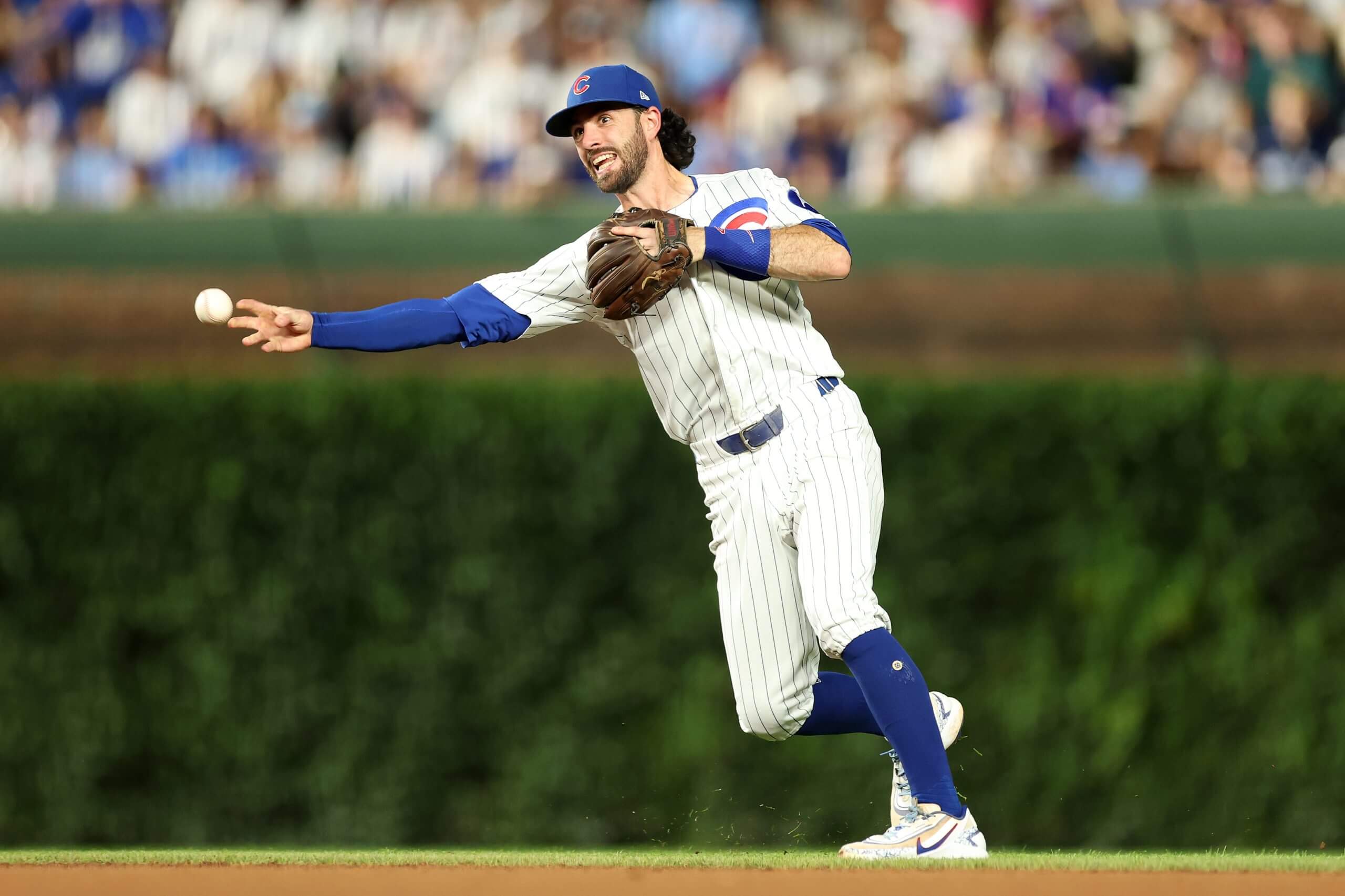 Dansby Swanson exits with apparent injury, creating questions for Cubs’ best-in-baseball defense