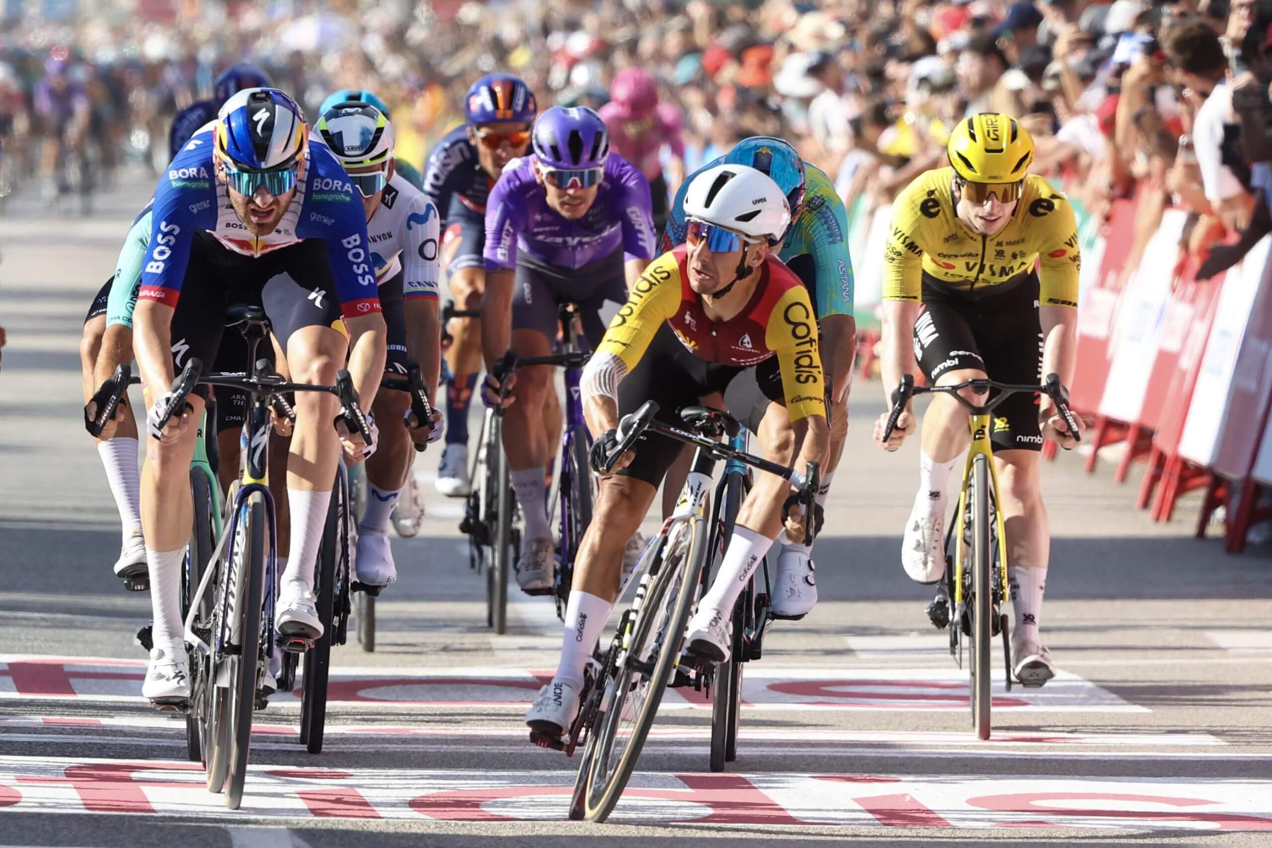 Coquard surfs sprint chaos to land first Grand Tour stage win as Pogacar abandon reshapes Vuelta GC