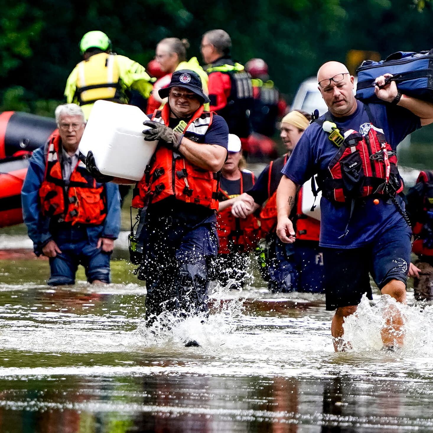 At least 7 people have died from days of heavy rain and record-setting flooding in Indiana