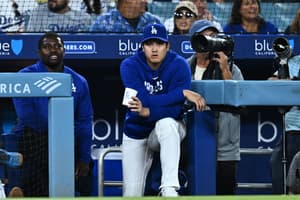 Ohtani out of Dodgers' lineup for 3rd straight day dealing with left knee, right biceps discomfort