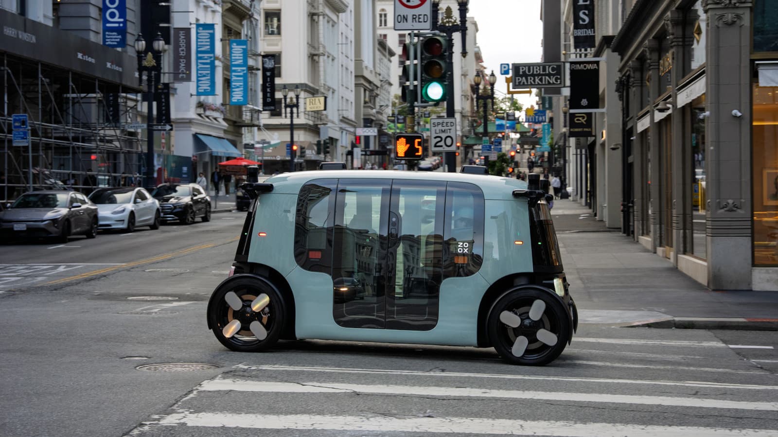 Amazon's Zoox is the first steering wheel-free robotaxi to get regulatory approval for paid rides