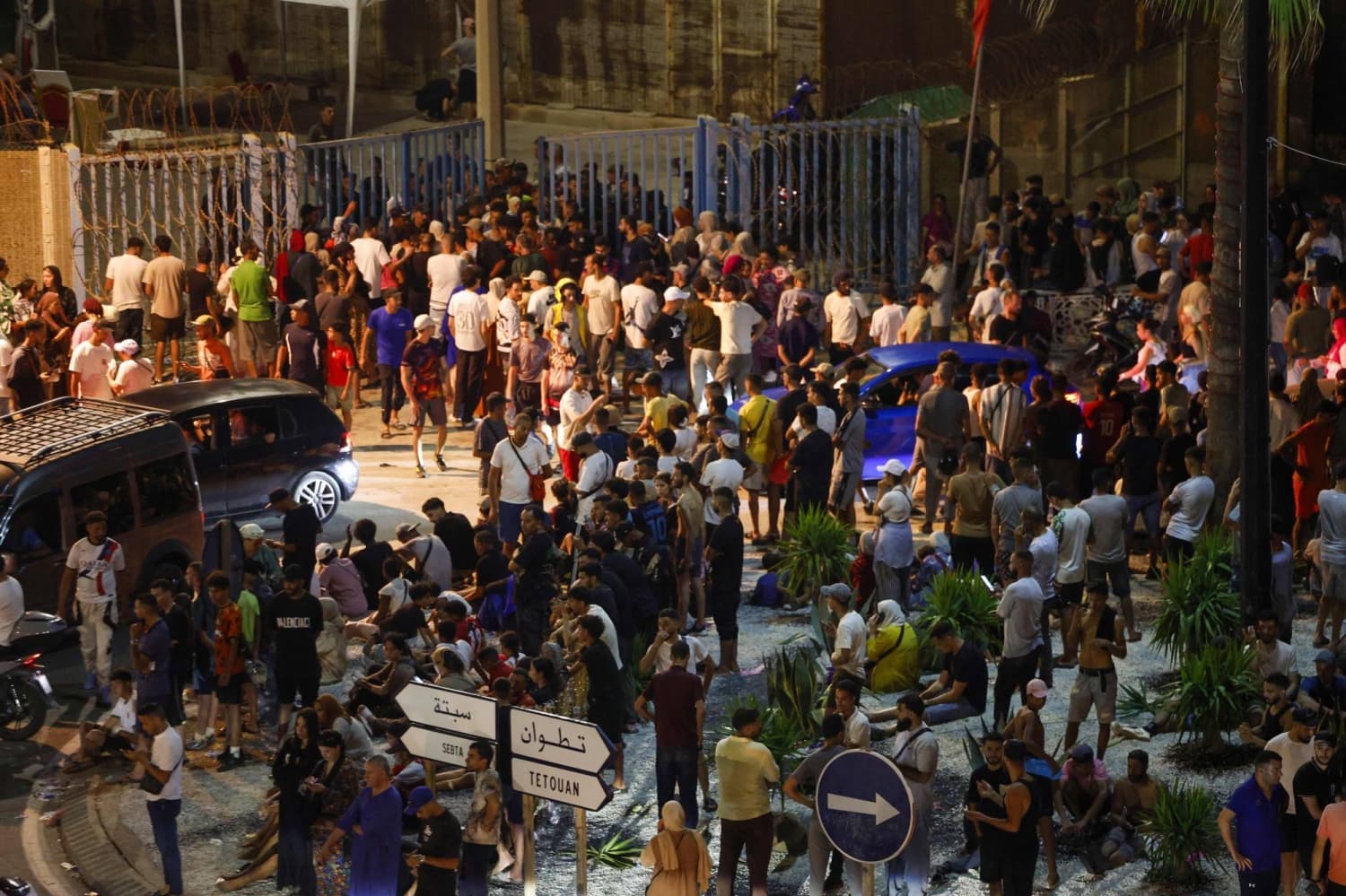Migrants pour into Spain’s Ceuta from Morocco, with military called in
