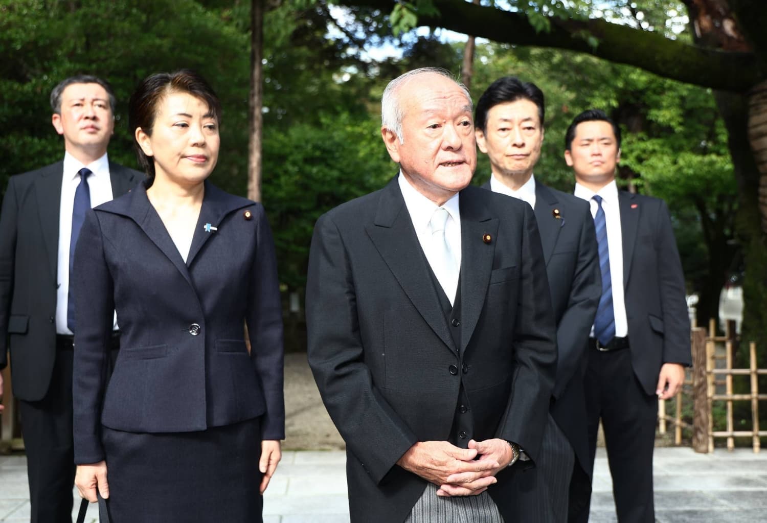 Japan defense minister visits war-linked Yasukuni Shrine as PM stays away