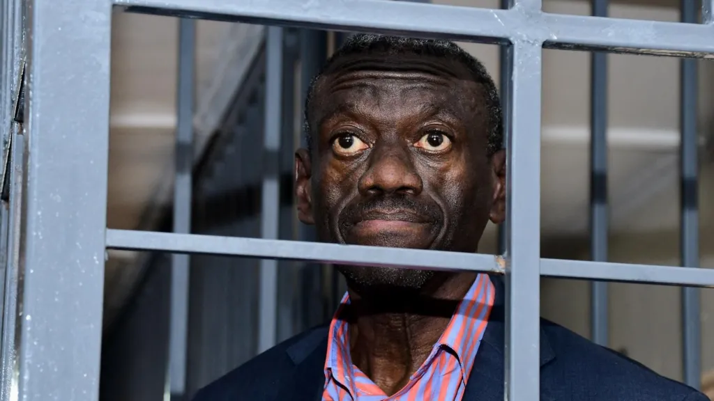 Detained Ugandan opposition figure is unconscious, in intensive care, his wife says