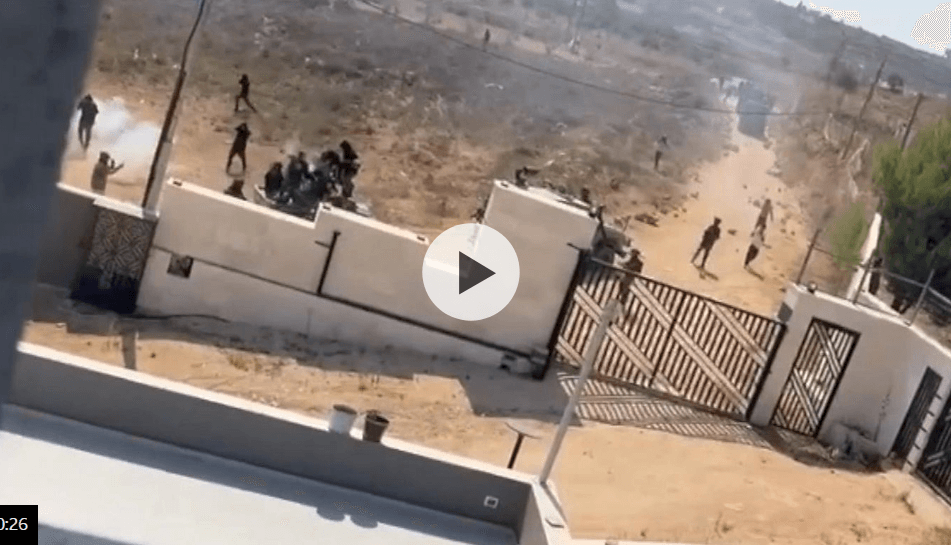 Israeli troops clash with settlers besieging Palestinian homes in West Bank