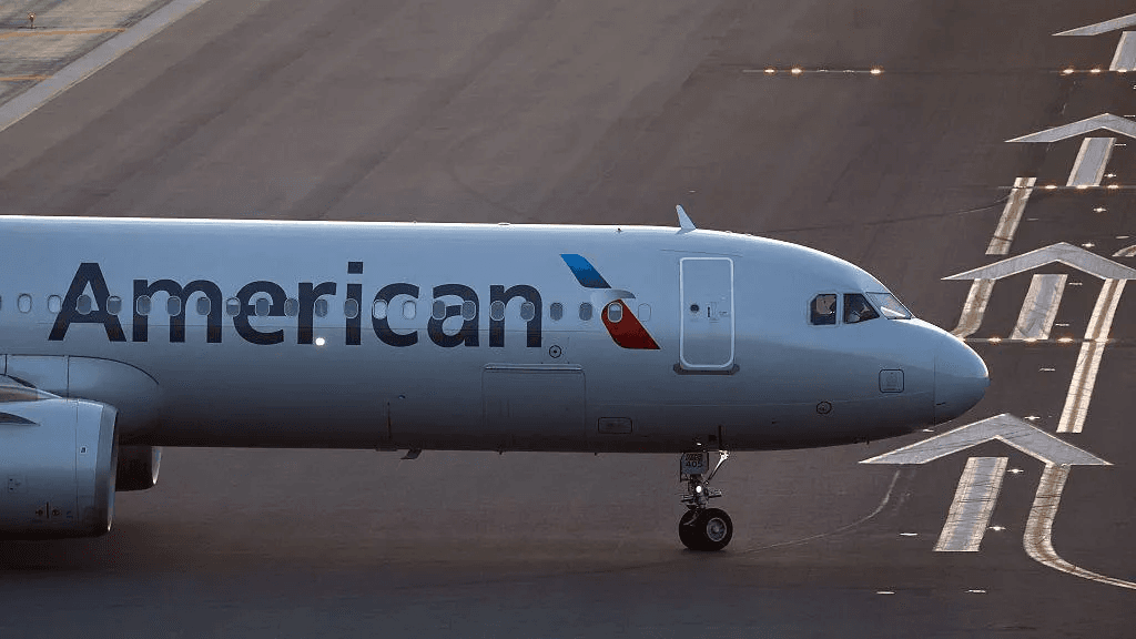Laptop catches fire on US flight, with passenger treated at airport
